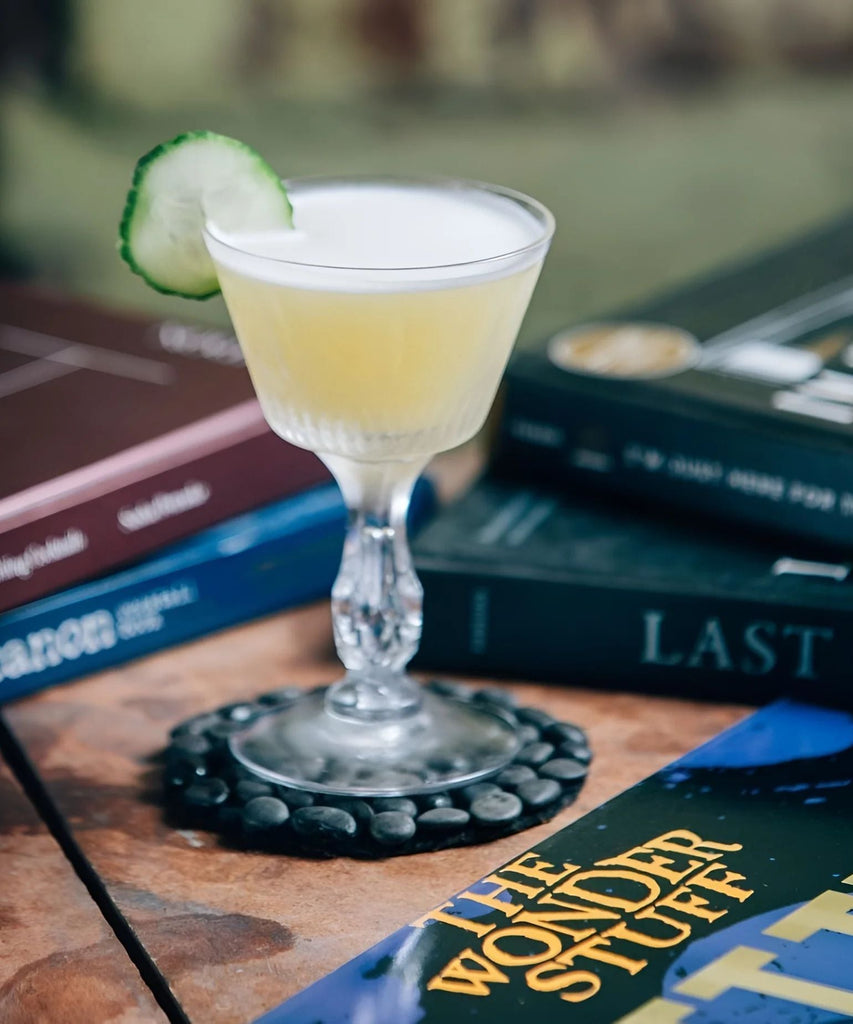 Hole in the Cup, a Pimm's Cup variation featuring blanco tequila, absinthe, and simple syrup