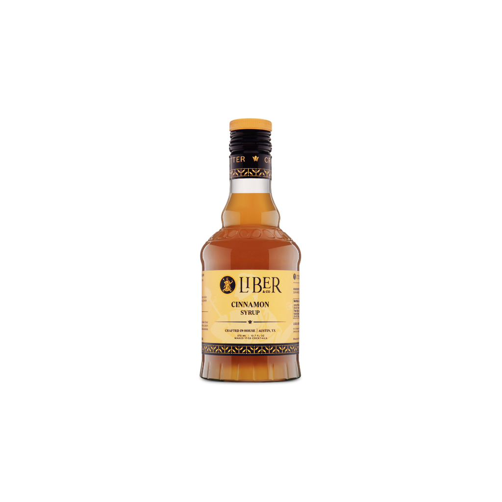 Bottle of Liber Cinnamon Syrup on a white background