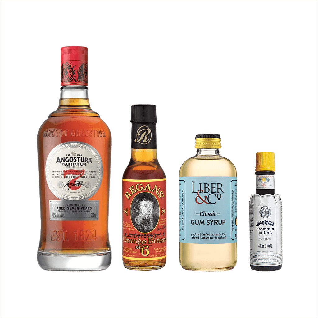 Bottles of Angostura 7 Year Old Rum, Regans Orange Bitters, Liber & Co. Gum Syrup, and Angostura Aromatic Bitters.