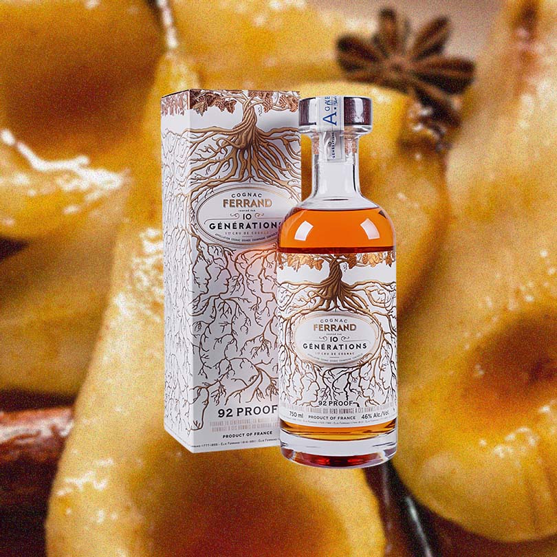 Bottle of Ferrand 10 Generations Cognac over backdrop of candied pears.