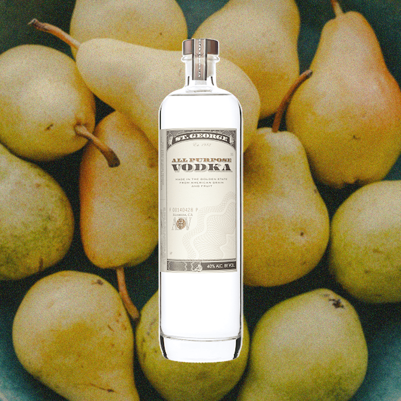 Bottle of St. George All Purpose Vodka over backdrop of pears
