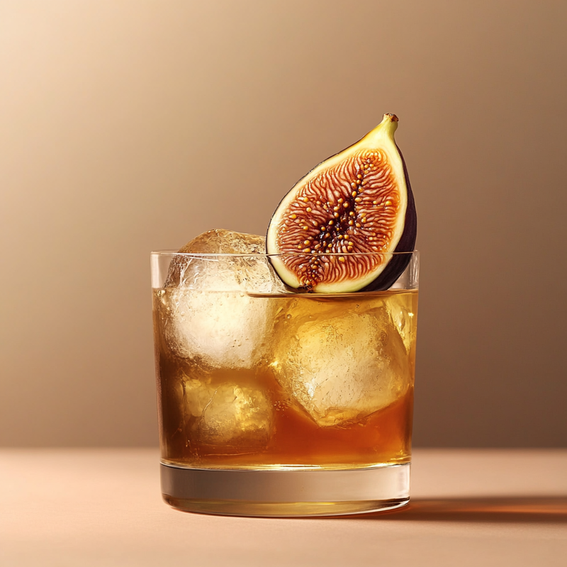 A photo of the Figgy French Fix cocktail containing Figs, Hennessy V.S. Cognac, Runny honey in a Old-Fashioned.