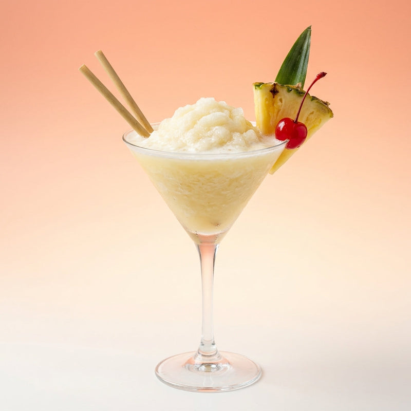 A photo of the Frozen Rum Colada Daiquiri cocktail containing Planteray 3 Stars White Rum, Fresh pressed pineapple juice, Freshly squeezed lime juice, Giffard Sugar Cane Syrup (Sirop Sucre de Canne) in a Martini (Large 10 oz).
