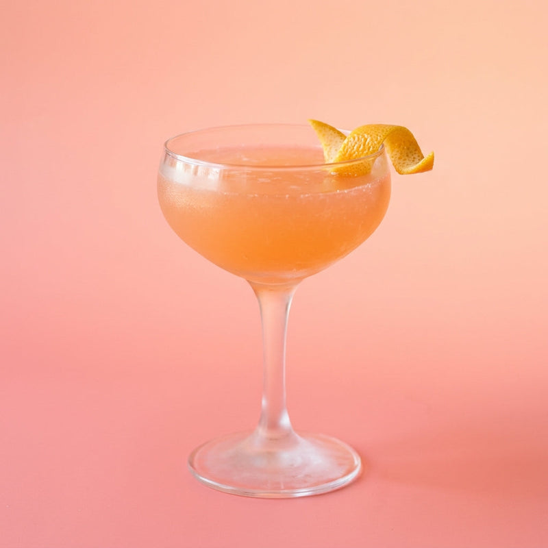 A photo of the Smoky Venetian Sour cocktail containing Del Maguey Vida Mezcal, Aperol Aperitivo, Luxardo Maraschino Liqueur, Freshly squeezed lime juice in a Coupe.
