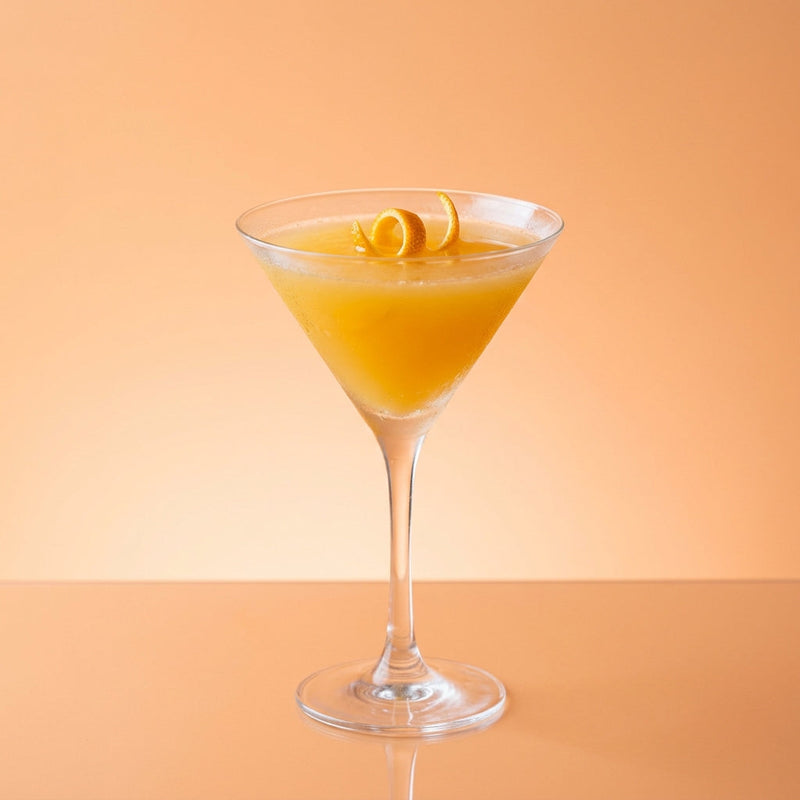 A photo of the Apple Blossom cocktail containing Beefeater London Dry Gin, Roger Groult 3 Year Reserve Pays D'Auge Calvados, Freshly squeezed orange juice, Giffard Sugar Cane Syrup (Sirop Sucre de Canne), Chilled water (reduce if wet ice) in a Martini.