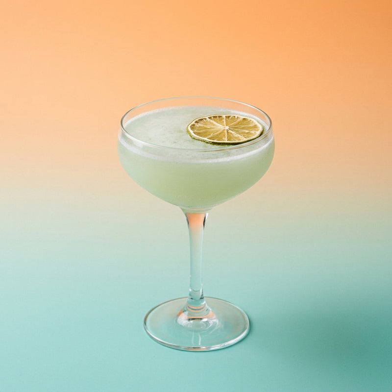 A photo of the The Gin Bitter Truth cocktail containing Beefeater London Dry Gin, Freshly squeezed lime juice, Giffard Sugar Cane Syrup (Sirop Sucre de Canne), Angostura Aromatic Bitters, Chilled water in a Coupe.
