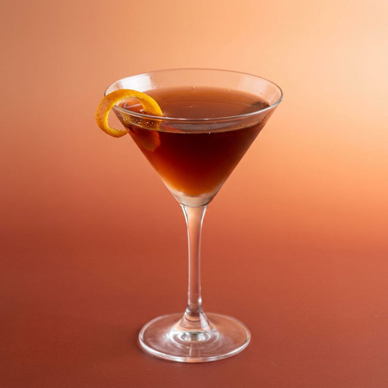 A photo of the The Parisian Boulevardier cocktail containing Hennessy V.S. Cognac, Drambuie Liqueur, Campari Aperitivo, Carpano Antica Formula Vermouth, Raisin sugar syrup (2:1) in a Martini.
