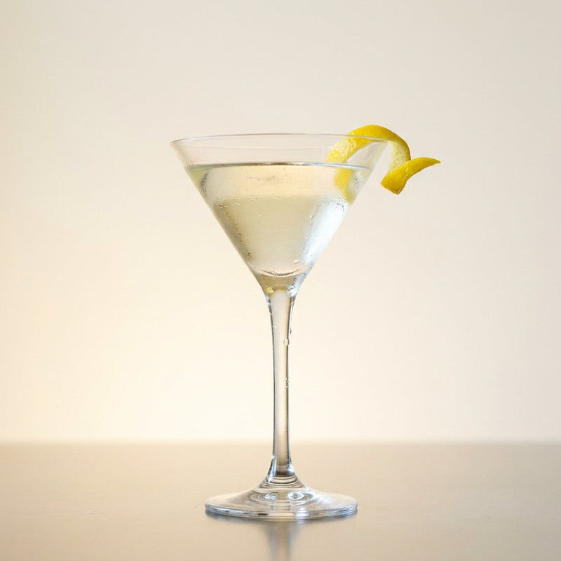 A photo of the The London Frost cocktail containing Beefeater London Dry Gin, Noilly Prat Dry Vermouth, Giffard Sugar Cane Syrup (Sirop Sucre de Canne) in a Martini.