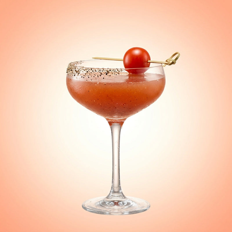 A photo of the Bloody Mary Sour cocktail containing Cherry tomato (chopped), Ketel One Vodka, Balsamic vinegar, Freshly squeezed lemon juice, Giffard Sugar Cane Syrup (Sirop Sucre de Canne), Black pepper in a Coupe.