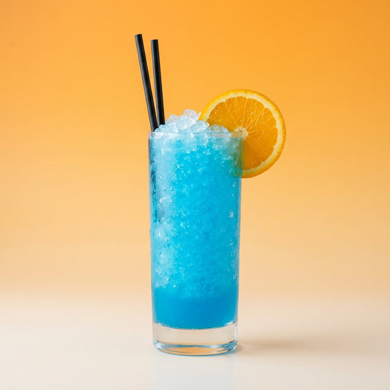 A photo of the Blue Lagoon cocktail containing Beefeater London Dry Gin, Ketel One Vodka, Giffard Blue Curaçao, Freshly squeezed lime juice, Giffard Sugar Cane Syrup (Sirop Sucre de Canne) in a Collins.