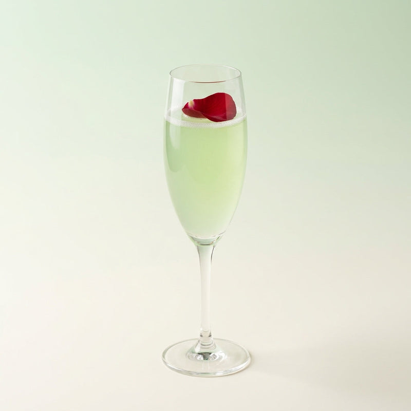 A photo of the Death in the Afternoon cocktail containing Pernod Absinthe, Freshly squeezed lemon juice, Giffard Sugar Cane Syrup (Sirop Sucre de Canne), Perrier Jouet Grand Brut Champagne in a Flute.