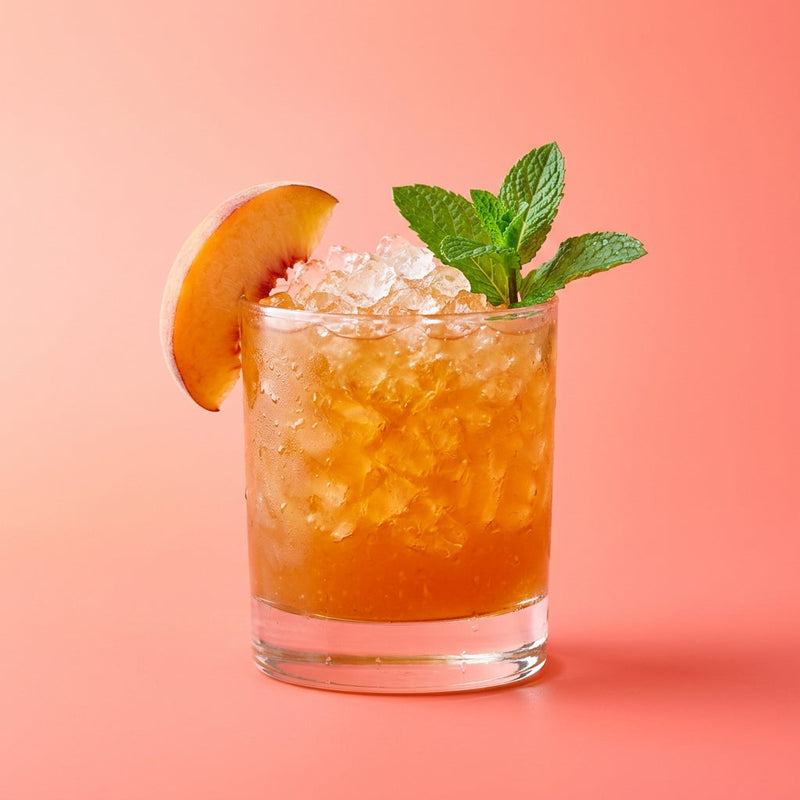 A photo of the Peach Cobbler Sour cocktail containing Savage & Cooke Cask Finished Bourbon, Giffard Triple Sec, Peach purée, Southern Comfort, Freshly squeezed lemon juice, Giffard Sugar Cane Syrup (Sirop Sucre de Canne) in a Old-Fashioned.