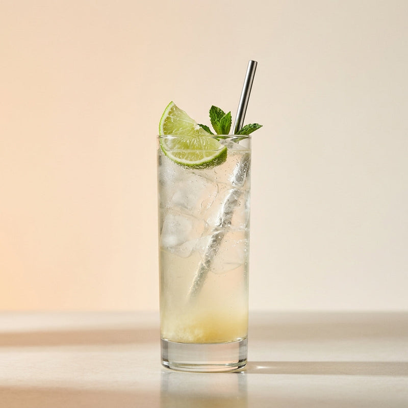 A photo of the Ginger Snap Gin Tonic cocktail containing Fresh root ginger (thumbnail sized), Beefeater London Dry Gin, Giffard Sugar Cane Syrup (Sirop Sucre de Canne), Tonic water in a Collins.