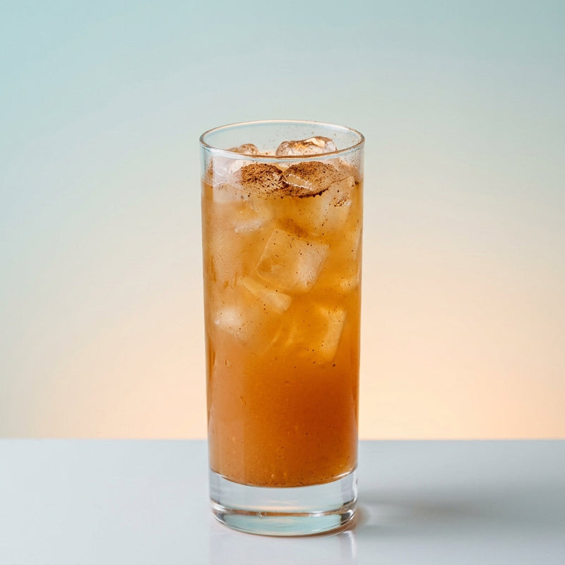 A photo of the Spiced Rum Manhattan Cooler cocktail containing Appleton Estate 8 Year Old Reserve Rum, Martini & Rossi Rosso Sweet Vermouth, Pressed apple juice, Freshly squeezed lime juice, Giffard Sugar Cane Syrup (Sirop Sucre de Canne) in a Collins.