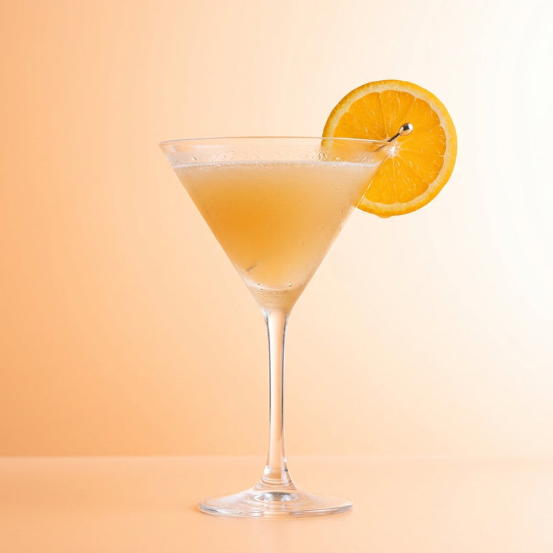 A photo of the Orange Rum Sidecar cocktail containing Planteray 3 Stars White Rum, Grand Marnier, Freshly squeezed orange juice, Freshly squeezed lime juice, Giffard Sugar Cane Syrup (Sirop Sucre de Canne) in a Martini.