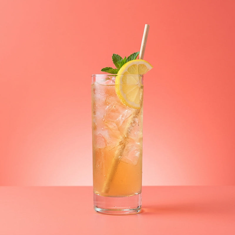 A photo of the Gin Punch  cocktail containing Beefeater London Dry Gin, Freshly squeezed lemon juice, Giffard Sugar Cane Syrup (Sirop Sucre de Canne), Chilled water, Angostura Aromatic Bitters in a Collins.