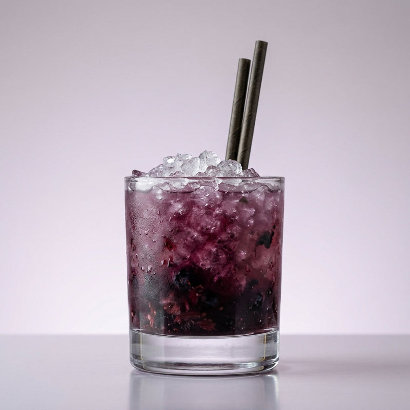 A photo of the Berry Crush cocktail containing Blackberries, Blueberries, Ketel One Vodka, Freshly squeezed lime juice, Giffard Sugar Cane Syrup (Sirop Sucre de Canne) in a Old-Fashioned.