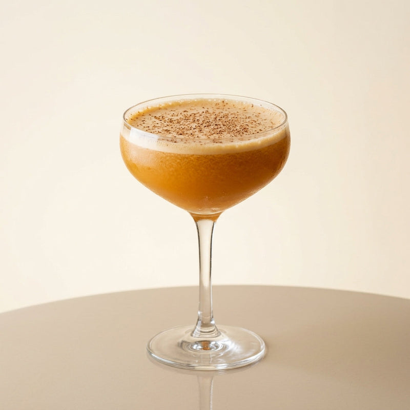 A photo of the Rum Grenadine Sour cocktail containing Appleton Estate 8 Year Old Reserve Rum, Freshly squeezed lemon juice, Freshly squeezed orange juice, Liber & Co. Real Grenadine in a Coupe.