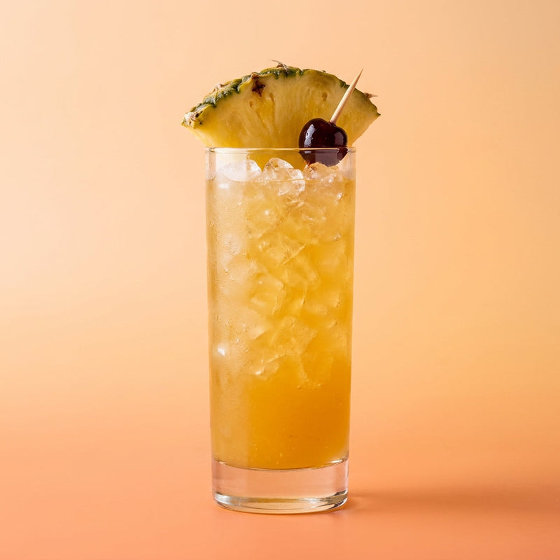 A photo of the Southern Sunrise Rum Collins cocktail containing Planteray 3 Stars White Rum, Southern Comfort, Fresh pressed pineapple juice, Rose's lime cordial, Freshly squeezed lemon juice, Giffard Sugar Cane Syrup (Sirop Sucre de Canne) in a Collins.