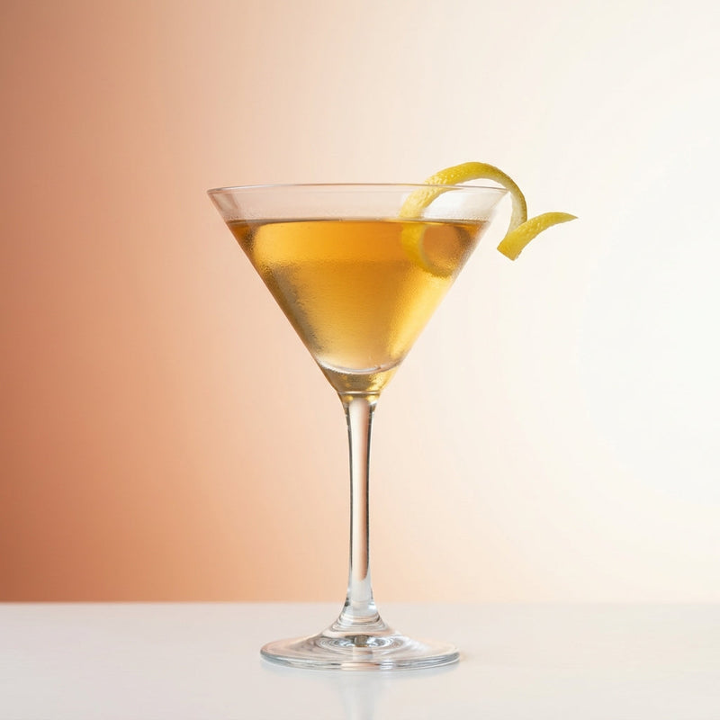 A photo of the Southern Comfort Vodka Martini cocktail containing Ketel One Vodka, Southern Comfort, Freshly squeezed lemon juice, Giffard Sugar Cane Syrup (Sirop Sucre de Canne) in a Martini.