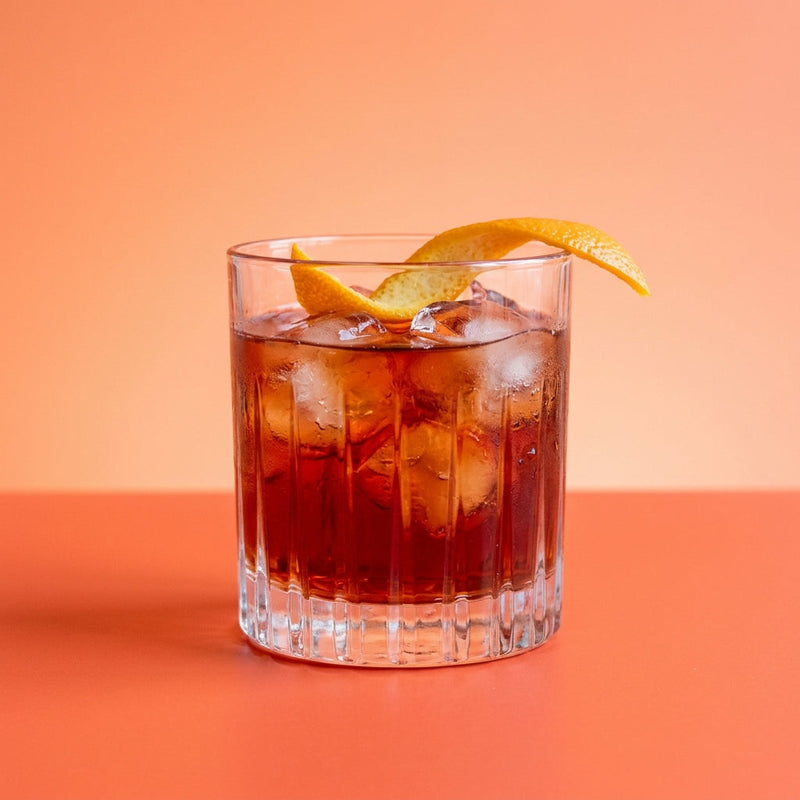 A photo of the Negroni Cocktail cocktail containing Beefeater London Dry Gin, Campari Aperitivo, Martini & Rossi Rosso Sweet Vermouth in a Old-Fashioned.