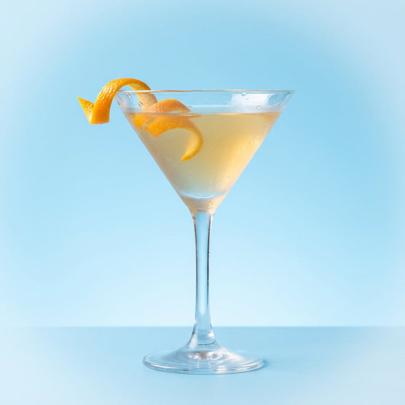 A photo of the London Cocktail cocktail containing Beefeater London Dry Gin, Pernod Absinthe, Giffard Sugar Cane Syrup (Sirop Sucre de Canne), Angostura Orange Bitters, Chilled water (reduce if wet ice) in a Martini.