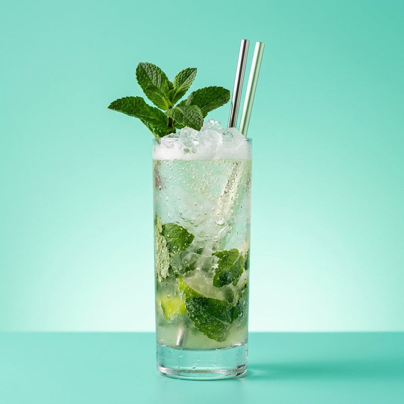 A photo of the Rum Royale Julep cocktail containing Mint leaves, Planteray 3 Stars White Rum, Freshly squeezed lime juice, Giffard Sugar Cane Syrup (Sirop Sucre de Canne), Perrier Jouet Grand Brut Champagne in a Collins.