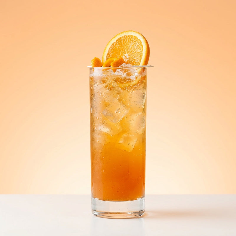 A photo of the Cherry Gin Buck cocktail containing Beefeater London Dry Gin, Heering Cherry Liqueur, Freshly squeezed orange juice, Three Cents Ginger Beer in a Collins.