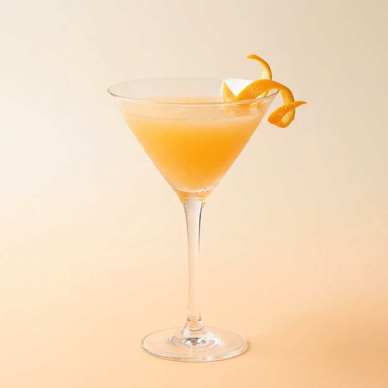 A photo of the Opal cocktail containing Beefeater London Dry Gin, Giffard Triple Sec, Freshly squeezed orange juice, Giffard Sugar Cane Syrup (Sirop Sucre de Canne), Orange flower water in a Martini.
