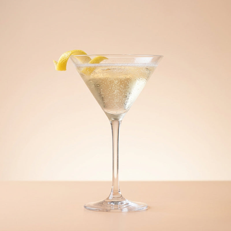 A photo of the Elderflower French Kiss cocktail containing Ketel One Vodka, St-Germain Elderflower Liqueur, Perrier Jouet Grand Brut Champagne in a Martini.