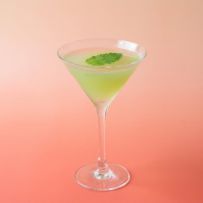 A photo of the Southside cocktail containing Mint leaves, Beefeater London Dry Gin, Freshly squeezed lime juice, Giffard Sugar Cane Syrup (Sirop Sucre de Canne) in a Martini.