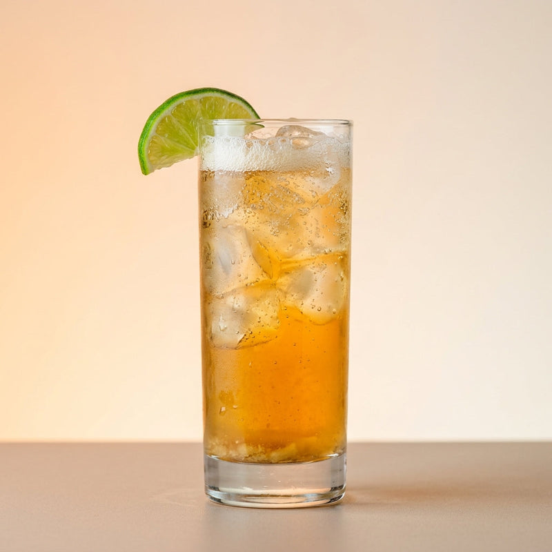 A photo of the Golden Mule Collins cocktail containing Fresh root ginger (thumbnail sized), Runny honey, Flor de Caña 4 Year Old Añejo Oro Rum, Freshly squeezed lime juice, Giffard Sugar Cane Syrup (Sirop Sucre de Canne), Ginger ale in a Collins.