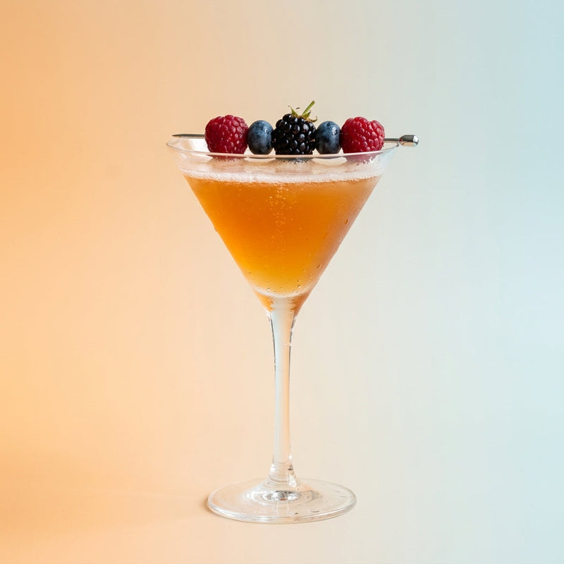 A photo of the Gin Daisy #2 cocktail containing Bols Genever, Grand Marnier, Freshly squeezed lemon juice, Giffard Sugar Cane Syrup (Sirop Sucre de Canne), Club soda in a Martini.