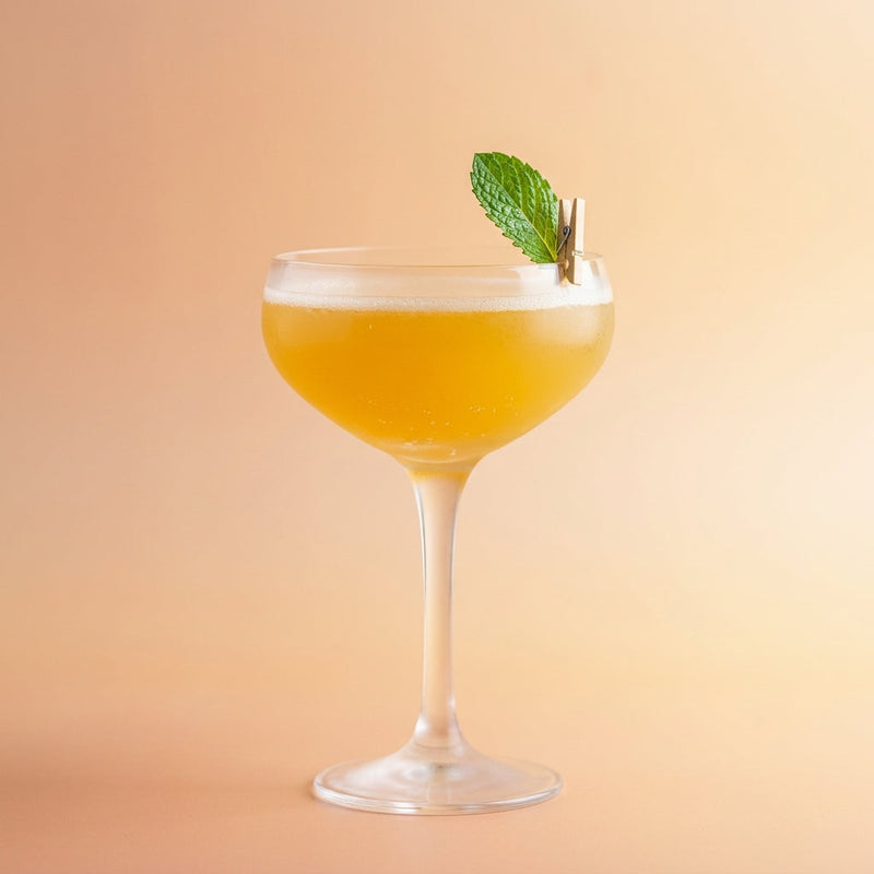 A photo of the Bernice cocktail containing Ketel One Vodka, Freshly squeezed lime juice, Galliano Autentico Liqueur, Giffard Sugar Cane Syrup (Sirop Sucre de Canne) in a Coupe.