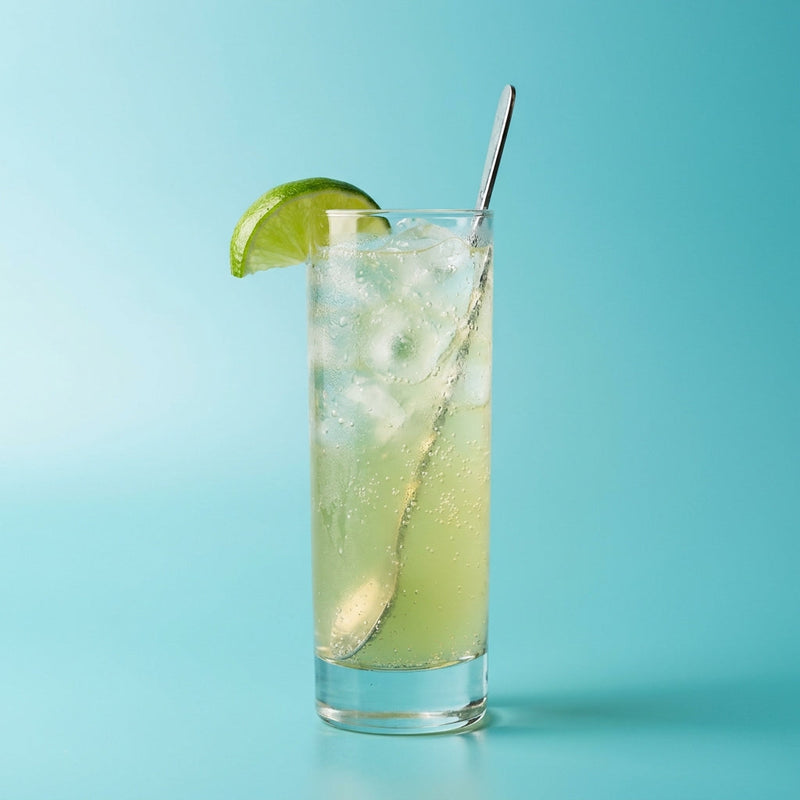 A photo of the Green Mule cocktail containing Pernod Absinthe, Freshly squeezed lime juice, Giffard Sugar Cane Syrup (Sirop Sucre de Canne), Three Cents Ginger Beer in a Collins.