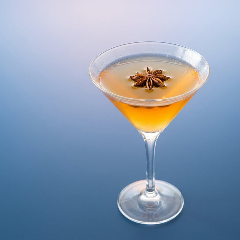 A photo of the The Anise Star Martini cocktail containing Ketel One Vodka, Grand Marnier, Pressed apple juice, Freshly squeezed lemon juice, Anise / aniseed syrup, Giffard Sugar Cane Syrup (Sirop Sucre de Canne) in a Martini.