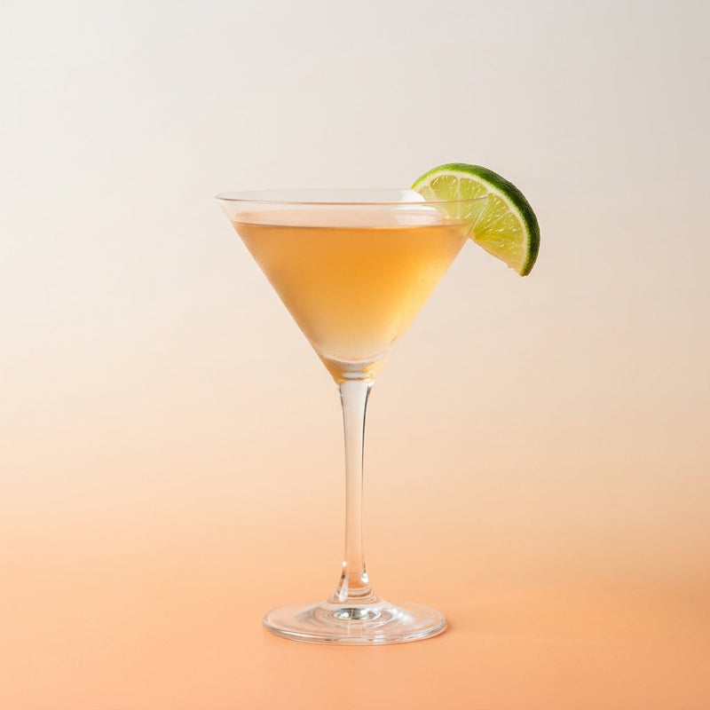 A photo of the Apricot Silk Martini cocktail containing Beefeater London Dry Gin, Giffard Abricot Du Roussillon, Noilly Prat Dry Vermouth, Freshly squeezed lime juice, Giffard Sugar Cane Syrup (Sirop Sucre de Canne) in a Martini.