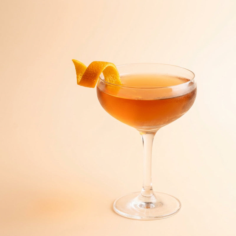 A photo of the Crimson Fino cocktail containing Valdespino Inocente Fino Sherry, Baldoria Verdant Vermouth, Solerno Blood Orange Liqueur, Campari Aperitivo in a Coupe.