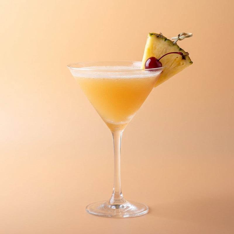 A photo of the Honolulu Cocktail No.1 cocktail containing Beefeater London Dry Gin, Freshly squeezed orange juice, Fresh pressed pineapple juice, Freshly squeezed lemon juice, Giffard Sugar Cane Syrup (Sirop Sucre de Canne) in a Martini.