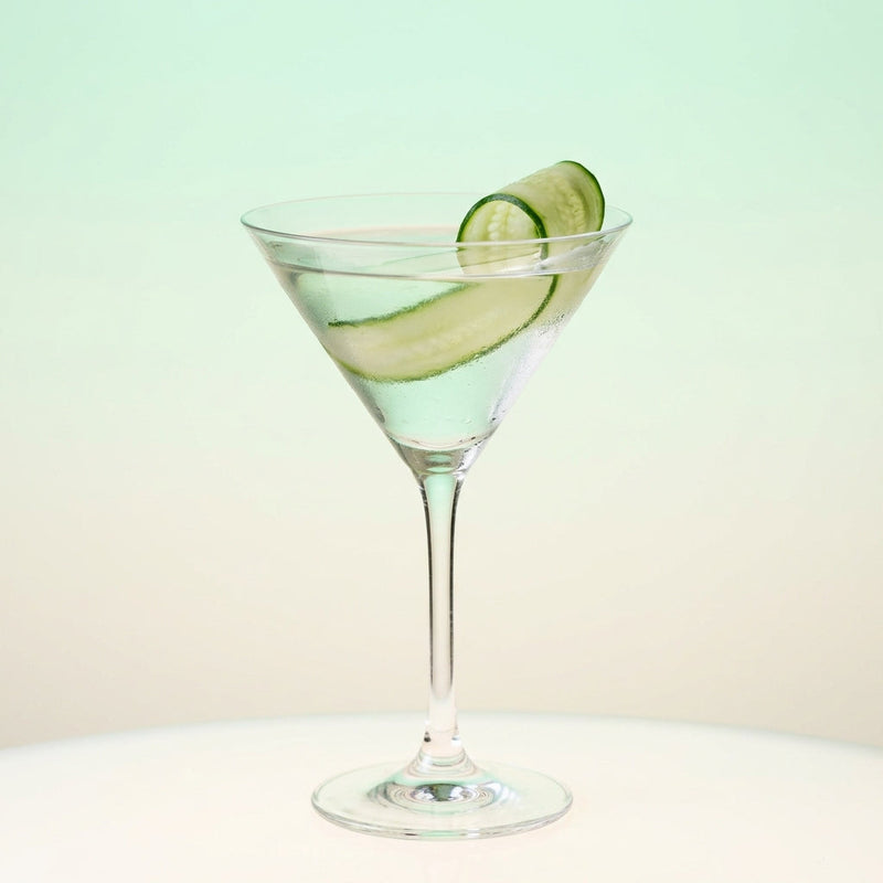 A photo of the Bison Patch Martini cocktail containing Ketel One Vodka, Zubrowka Bison Grass Vodka, English cucumber peeled, Giffard Sugar Cane Syrup (Sirop Sucre de Canne) in a Martini.