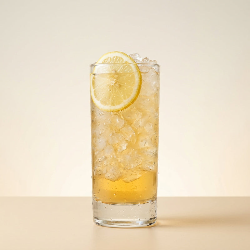 A photo of the Mississippi Punch cocktail containing Savage & Cooke Cask Finished Bourbon, Hennessy V.S. Cognac, Freshly squeezed lemon juice, Giffard Sugar Cane Syrup (Sirop Sucre de Canne), Chilled water in a Collins.
