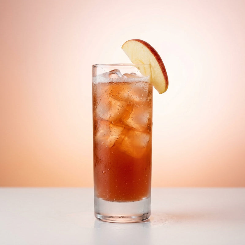 A photo of the Apricot Rum Collins cocktail containing Planteray 3 Stars White Rum, Giffard Abricot Du Roussillon, Pressed apple juice, Cranberry juice, Freshly squeezed lime juice, Giffard Sugar Cane Syrup (Sirop Sucre de Canne) in a Collins.