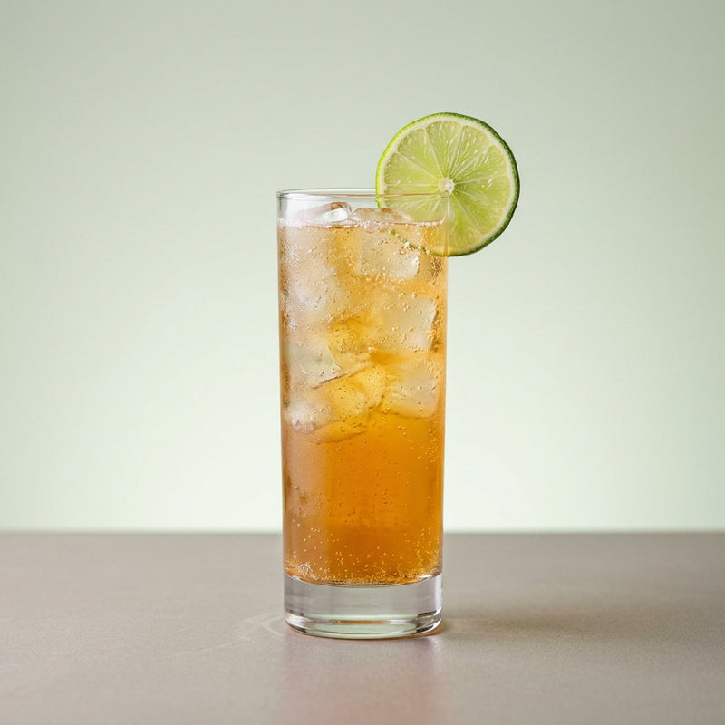 A photo of the Tequila Mule Kick cocktail containing Milagro Reposado Tequila, Freshly squeezed lime juice, Giffard Sugar Cane Syrup (Sirop Sucre de Canne), Angostura Aromatic Bitters, Three Cents Ginger Beer in a Collins.