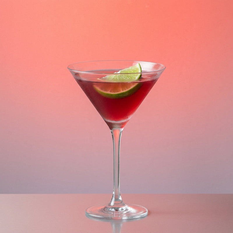 A photo of the Purple Martini cocktail containing Ketel One Vodka, LEJAY LAGOUTE Crème de Cassis, Freshly squeezed lime juice, Giffard Sugar Cane Syrup (Sirop Sucre de Canne) in a Martini.