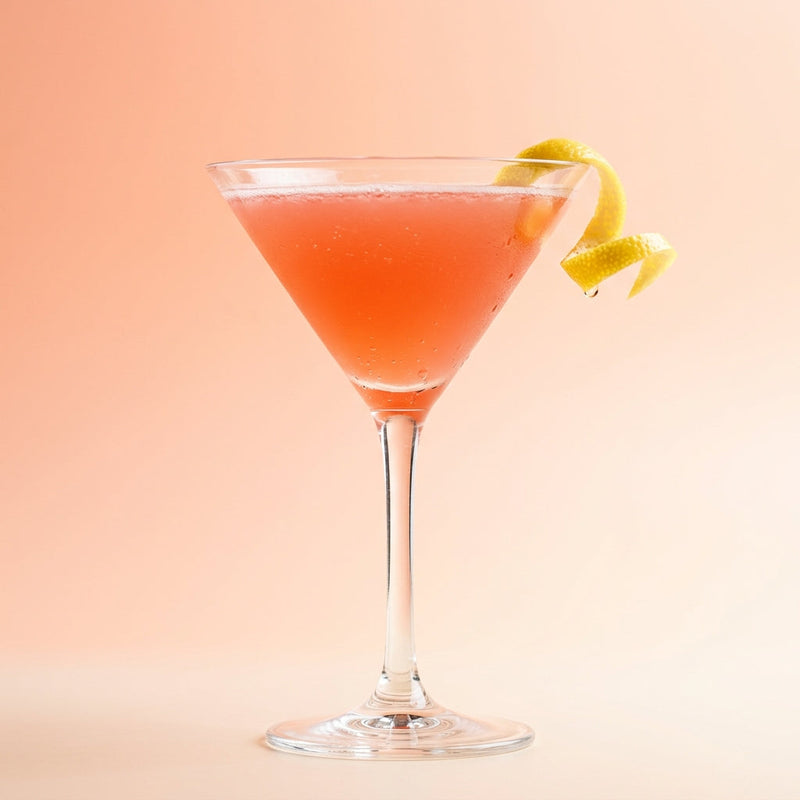 A photo of the Crimson Citrus Martini cocktail containing Beefeater London Dry Gin, Giffard Triple Sec, Campari Aperitivo, Freshly squeezed lemon juice, Giffard Sugar Cane Syrup (Sirop Sucre de Canne) in a Martini.
