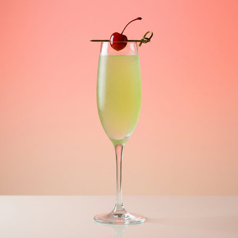 A photo of the Moonlit Maraschino Fizz cocktail containing Planteray 3 Stars White Rum, Luxardo Maraschino Liqueur, Pernod Absinthe, Freshly squeezed lime juice, Giffard Orgeat Syrup, Orange flower water, Chilled water (reduce if wet ice) in a Flute.