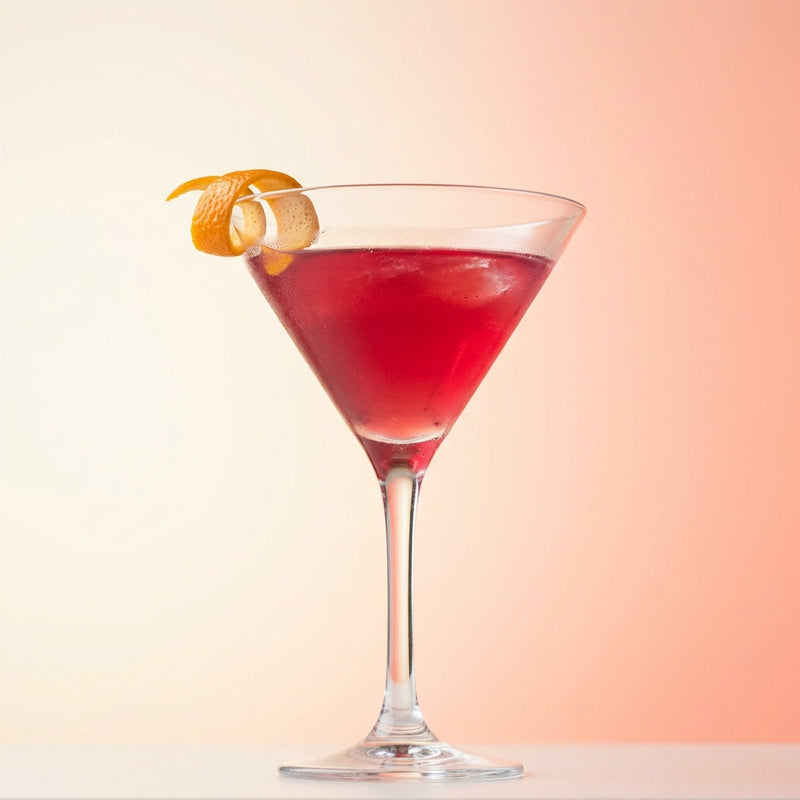 A photo of the Cherry Sidecar Blanc cocktail containing Etter Kirsch AOP Zug Eau de Vie, Giffard Triple Sec, Cranberry juice, Freshly squeezed lime juice in a Martini.
