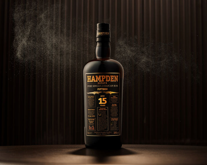 Hampden 15-year-old rum bottle on a dark background