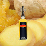 Bottle of Barrow's Intense Ginger Liqueur over yellow backdrop.