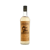 A bottle of Cimarron Reposado Tequila with a label showcasing the brand name and a graphic of a dragon, against a plain background.